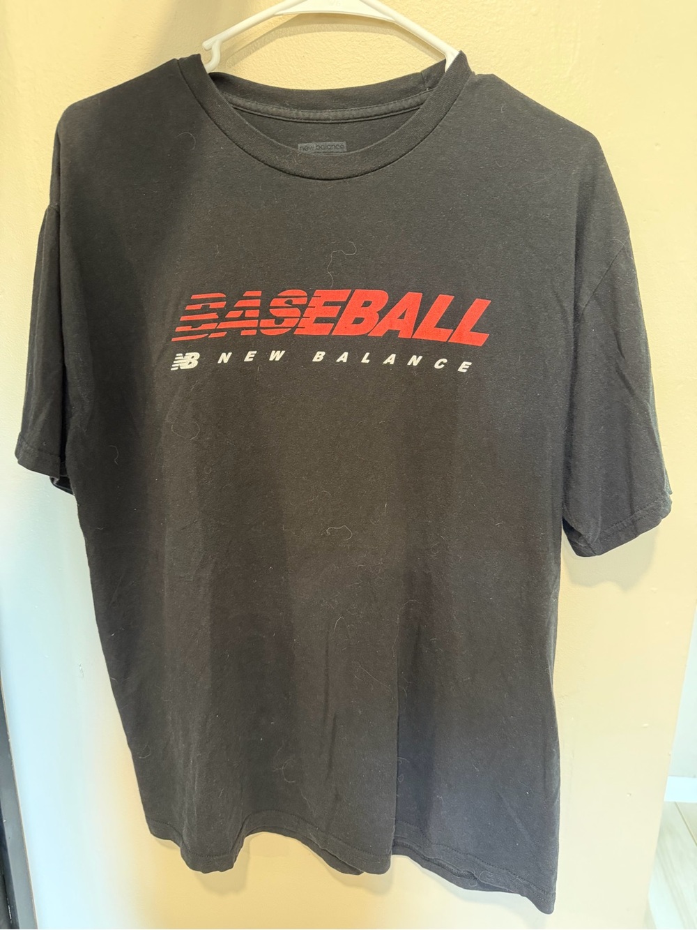 New Balance Black Tee with Red 'BASEBALL' Graphic